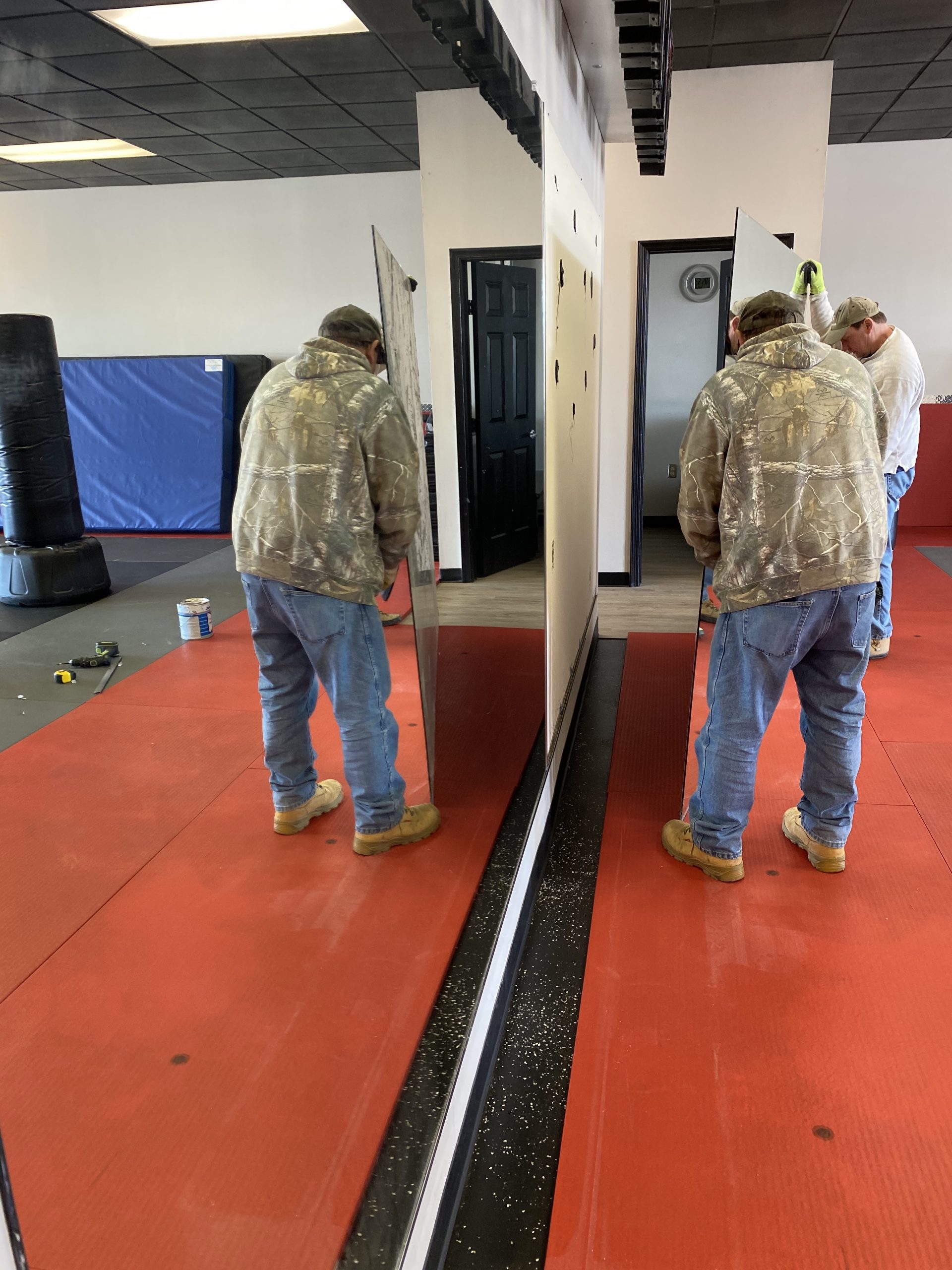Men Removing Mirrors and GB Remodel